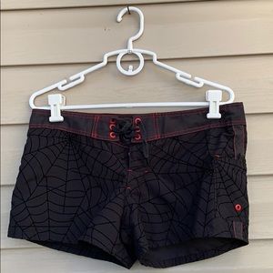 Counter Culture women’s black red boardshorts